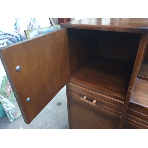 636 - Oak sideboard with glass sliding door display