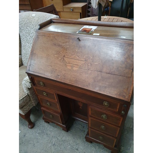 639 - A vintage 7 drawer inlaid mahogany fall front bureau desk with lower centre cupboard - one a/f handl... 