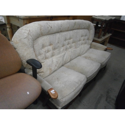 687 - An upholstered wood framed 3 seater settee