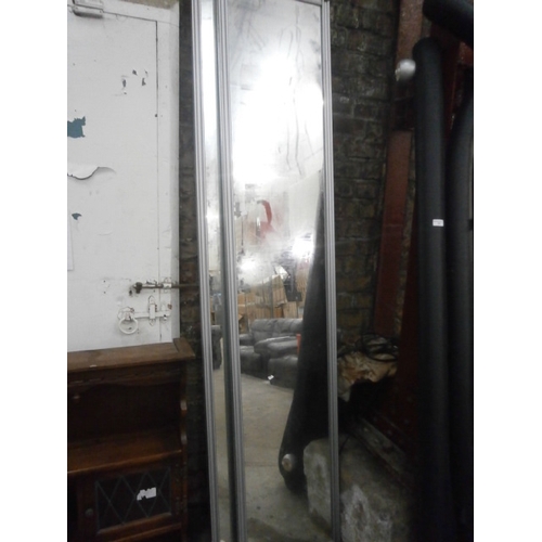 690 - A pair of framed mirror sliding door panels