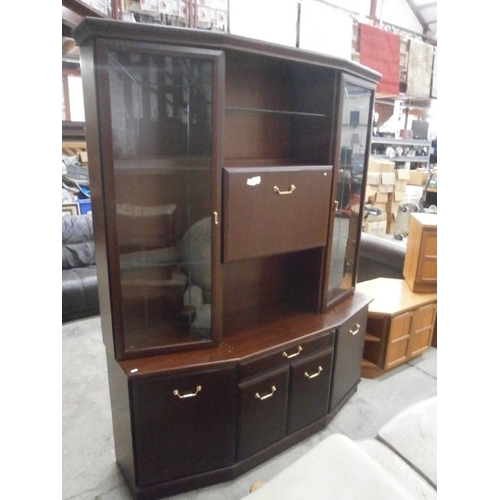 692 - A large glazed mahogany wall unit