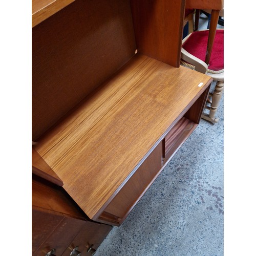 653 - Small retro teak wall unit