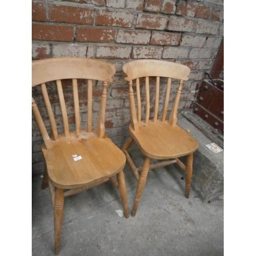 A pair of vintage kitchen chairs