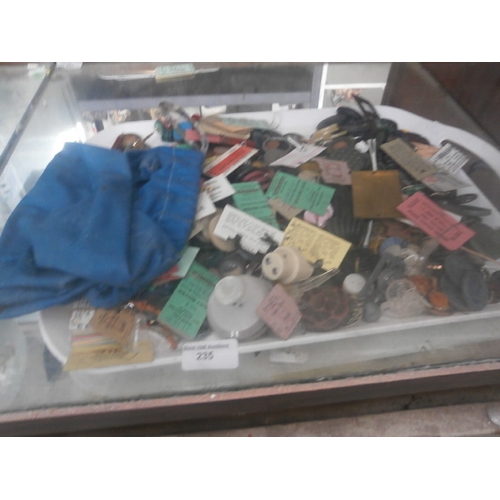 235 - Lot inc assorted buttons, bus tickets, etc