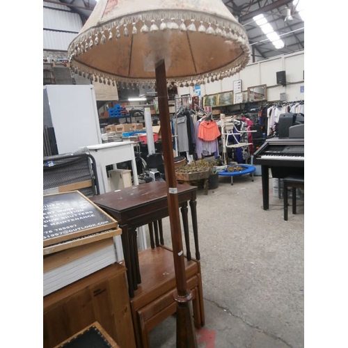 650 - A vintage standard lamp with shade