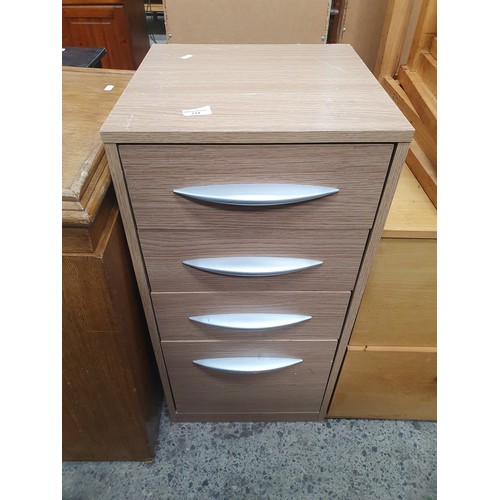 714 - A small 4 drawer chest