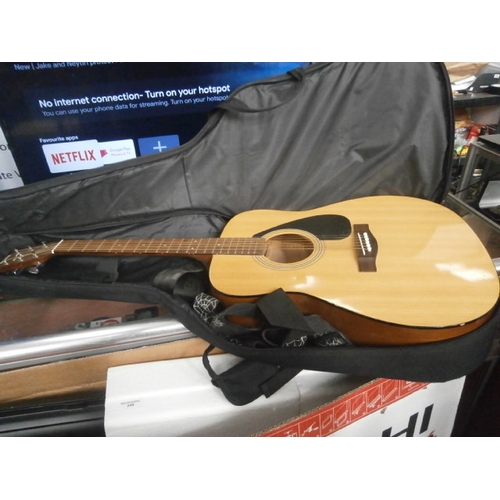 248 - Yamaha F310 acoustic guitar with case