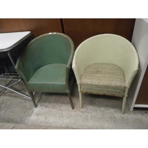 697 - A pair of vintage tub chairs