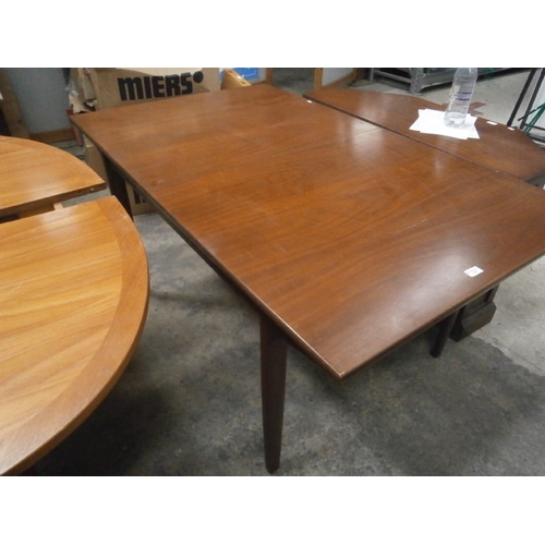 702 - A large retro McIntosh style extending teak dining table