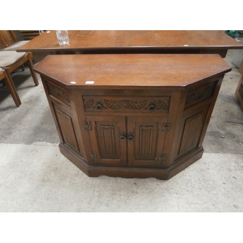 703 - A vintage OLD CHARM carved base unit with single drawer and linenfold panels