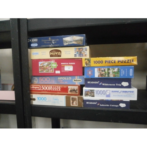 81 - Eleven assorted jigsaws
