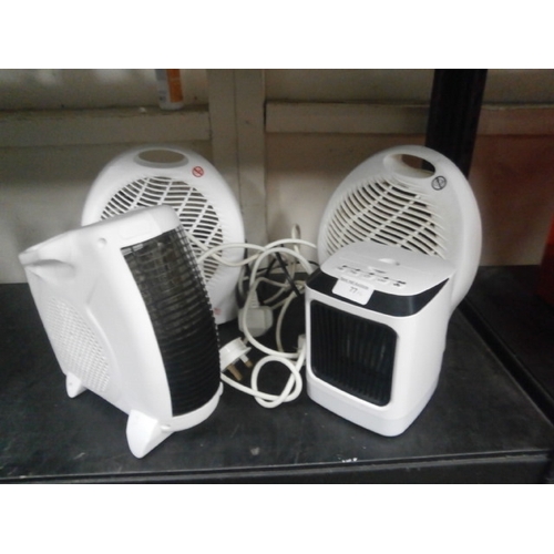 77 - three assorted fan heaters in working order