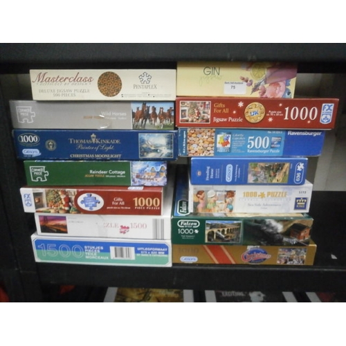 75 - 14 assorted jigsaws