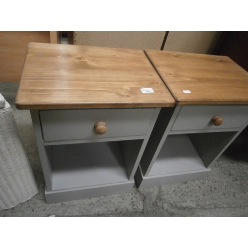 643 - A pair of painted wooden bedside stands with drawers