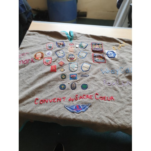 64 - VINTAGE GIRL GUIDE CAPE WITH SOME RARE BADGES / PATCHES