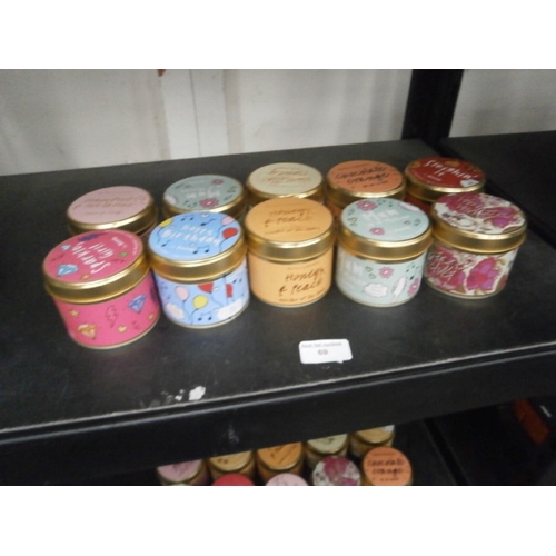 69 - Ten assorted new candles