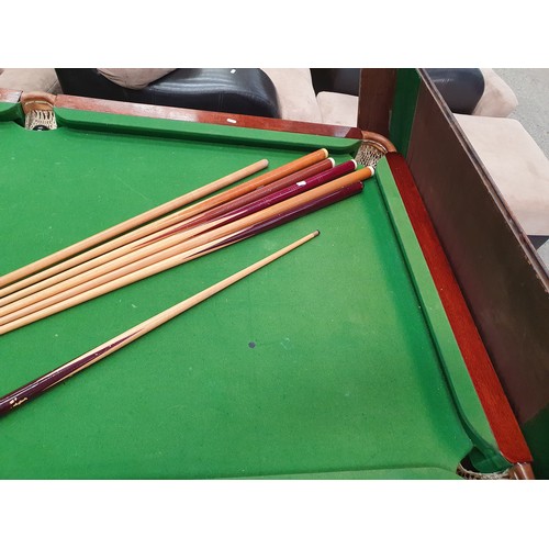 691 - Dining/slate bed Snooker/pool table with with cues balls etc