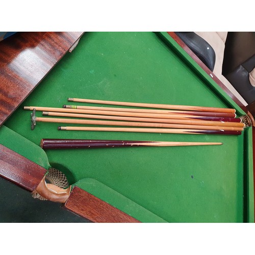 691 - Dining/slate bed Snooker/pool table with with cues balls etc