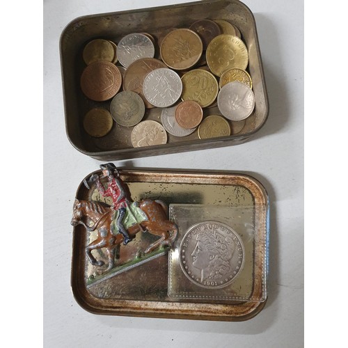 103 - Tin of vintage coins inc America dollar & old lead figure