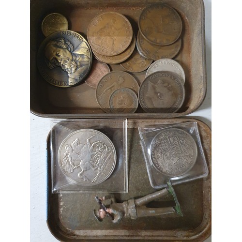 104 - Tin of vintage coins inc America dollar & old lead figure