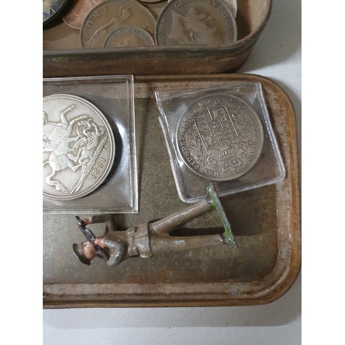 104 - Tin of vintage coins inc America dollar & old lead figure