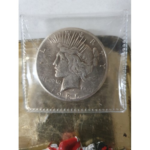 105 - Tin of vintage coins inc America dollar & 2 old lead figure