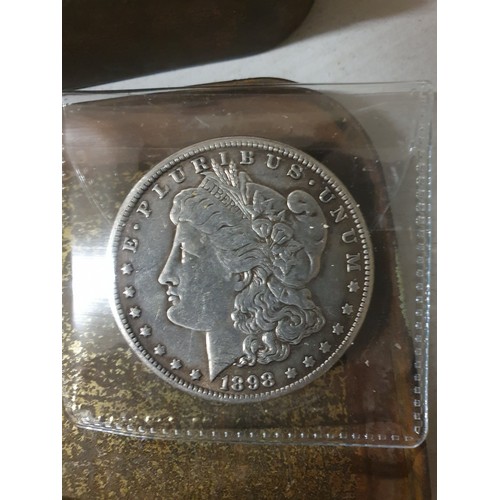 112 - Tin of vintage coins inc America dollar & old lead figure