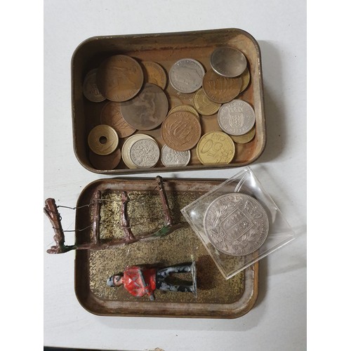 114 - Tin of vintage coins & old lead figure