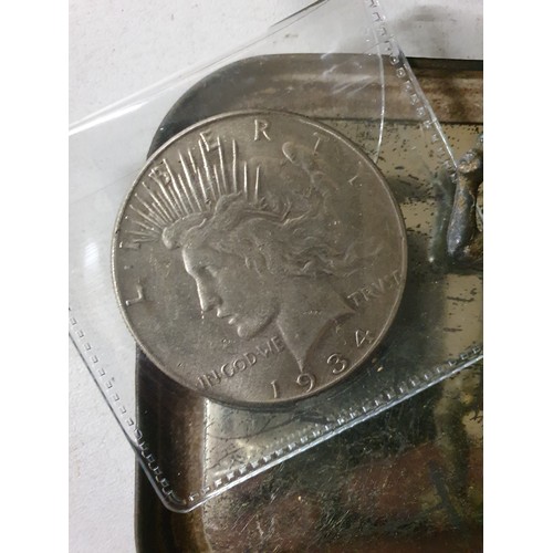 115 - Tin of vintage coins inc America dollar & old lead figure