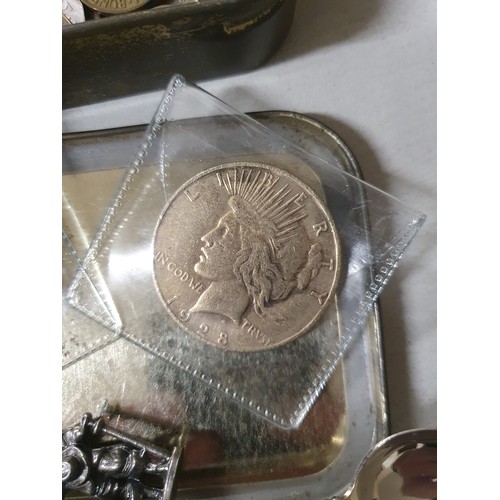 118 - Tin of vintage coins inc America dollar & old lead figure