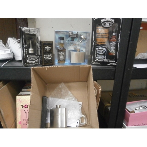 24 - Box of Jack Daniels merch inc hip flask, fridge magnets, bottle opener, etc