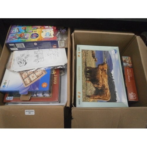 63 - Two boxes of assorted jigsaws