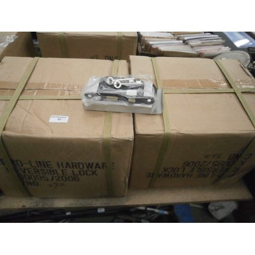 82 - Two boxes of new reversible door locks