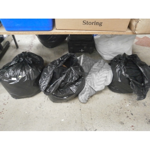 139 - Three bags of assorted clothing