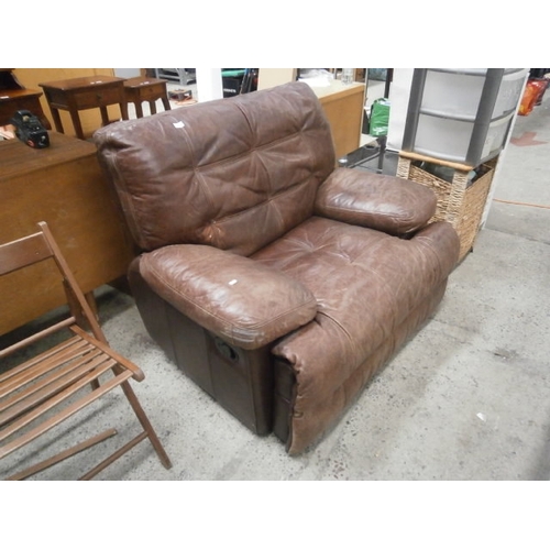 674 - A large padded leather recliner armchair