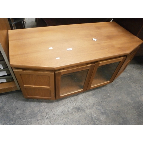 676 - A retro teak PARKER KNOLL style glazed TV stand cabinet