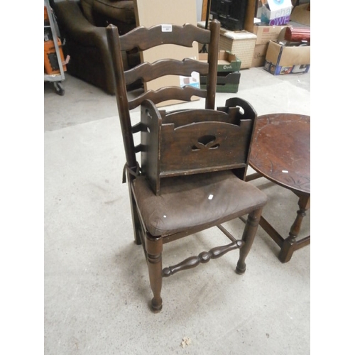 681 - A large vintage ladder back chair and a magazine rack