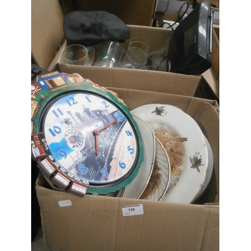 139 - Two boxes inc decorative plates, glassware, radio