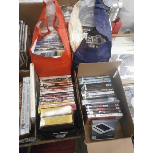 163 - Two bags and two boxes of DVDs