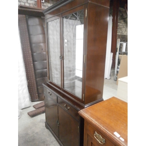 670 - A vintage glazed 2 drawer wall unit