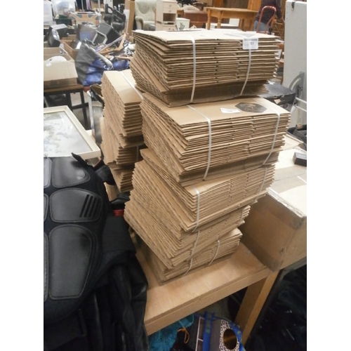 109 - Nine packs of flat pack boxes