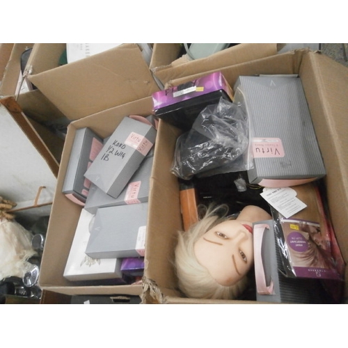 180 - Two boxes of assorted wigs