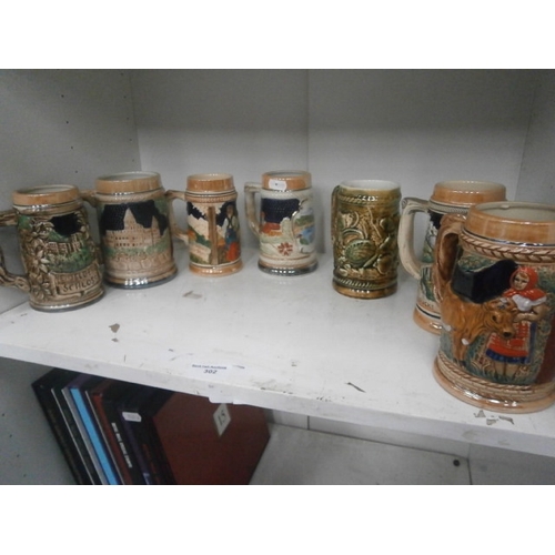 302 - Seven assorted steins