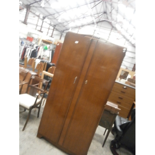 689 - A vintage 2 door wardrobe