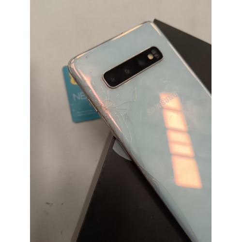 281 - Samsung galaxy S10 in original box in working order has a slight crack on lower screen & on back (se... 