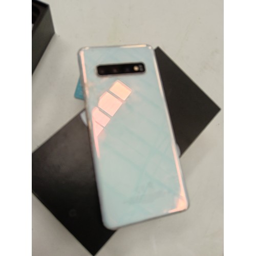 281 - Samsung galaxy S10 in original box in working order has a slight crack on lower screen & on back (se... 