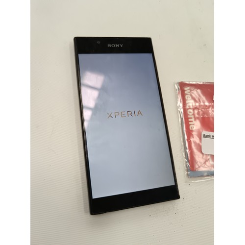 282 - Nokia xperia in working order no charger with new Vodafone sim