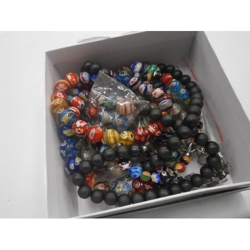 250 - A box of various Moroni beads