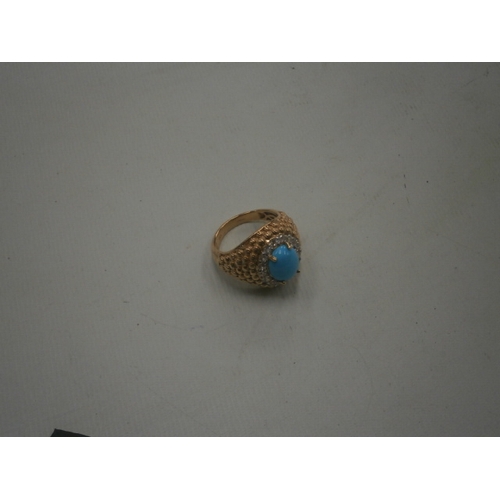 257 - Gold coloured silver ring with sleeping beauty turquoise zirocn stone