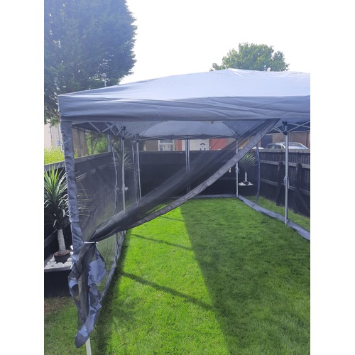 600 - Large pop up Gazebo with netted side panels - 6m x 3m